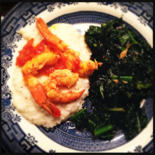 Tomato saffron scampi with polenta and sautéed Tuscan kale