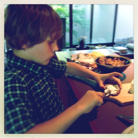 My son Flynn gets in on the raw cheeses