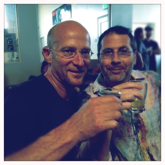 Jeff and Vic raise a glass to our friends