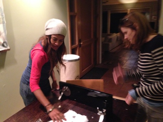 Girls figuring out the pedestal