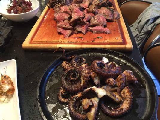 Octopus and ribeye fresh from the fire