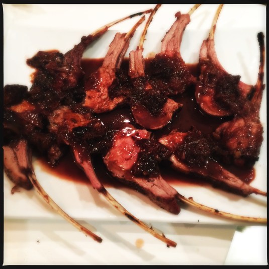 Wild boar rib rack with prune wine sauce